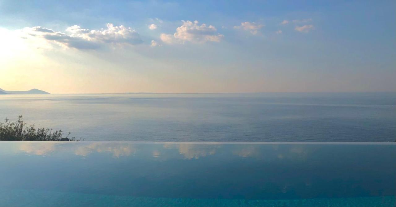 Kuro Beach House - Oceanfront Luxury & 25M Pool Achlia Bagian luar foto